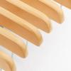 imageSONGMICS 12 Pack Wooden Pants Hangers Premium Solid Wood with NonSlip Felt Hold Pants Tightly Smooth Finish Wood Skirt Hangers with 360 Swivel Hook Natural UCRW00712With Adjustable Clips