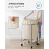 imageSONGMICS 502Gallon 190 L Laundry Basket with Wheels Rolling Round HeavyDuty Laundry Hamper Cart with Steel Frame and Removable Bag 2 Locking Wheels Cream White and Metallic Silver URLS01MZCream White  Metallic Silver