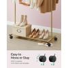 imageSONGMICS Clothes Rack with Wheels Clothing Rack for Hanging Clothes 254 mm Metal Garment Rack with Dense Mesh Storage Shelf 110 lb Load Capacity 2 Brakes Black UHSR25BKGold