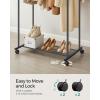 imageSONGMICS Clothes Rack with Wheels Clothing Rack for Hanging Clothes 254 mm Metal Garment Rack with Dense Mesh Storage Shelf 110 lb Load Capacity 2 Brakes Black UHSR25BKBlack