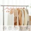 imageSONGMICS 24 Pack Pants Hangers 167 Inch Coat Hangers with Rose Gold Colored Movable Clips HeavyDuty NonSlip SpaceSaving for Pants Skirts Dresses Light Pink UCRF14PK24Light Pink