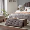 imageSONGMICS MAZIE Collection  30 Inches Storage Ottoman Bench with Flipping Lid Storage Chest Footstool Load 660 lb for Entryway Living Room Bedroom Synthetic Leather Coffee Brown ULSF045K01Brown