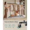 imageSONGMICS Clothes Rack with Wheels HeavyDuty Clothing Rack for Hanging Clothes Portable 177 x 36252 x 636 Inches with Extendable Rail 220 lb Load Capacity Black UHSR13BKV1Black
